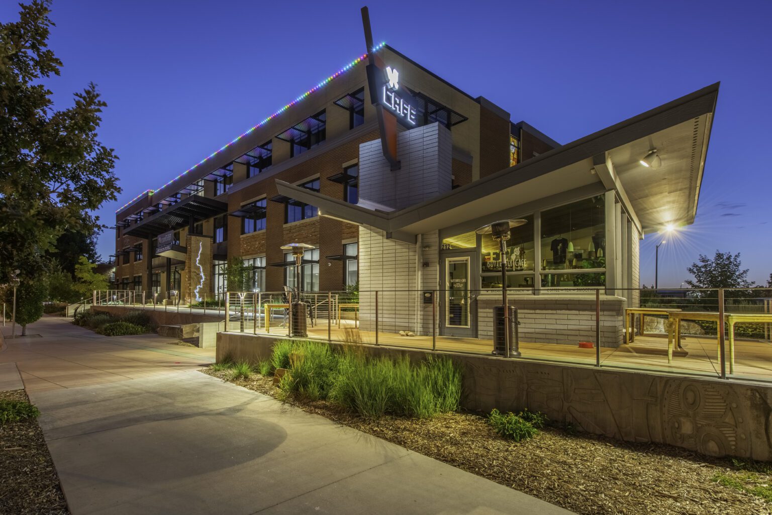 Brick building decorated with multi color LED trim lighting
