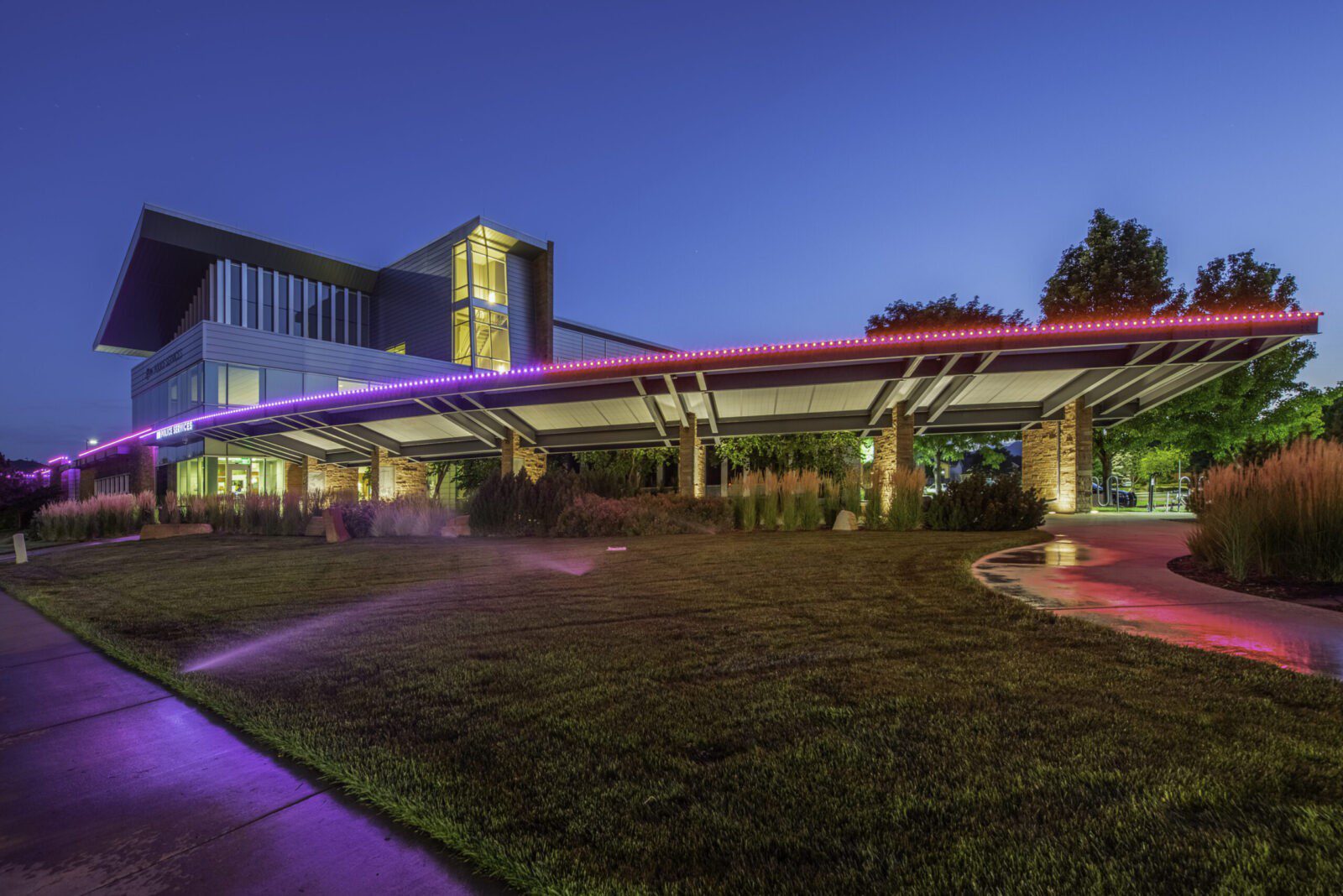 Local municipal building with purple and red commercial LED lighting