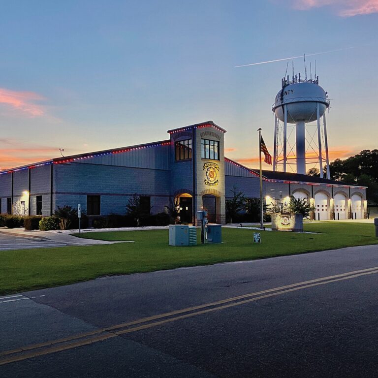 Red, white, and blue LED trim lighting on Fire Station