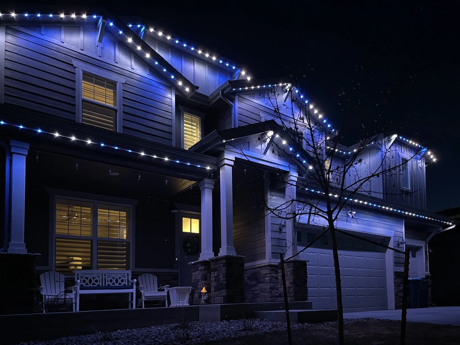 House with blue and white LED trim lighting