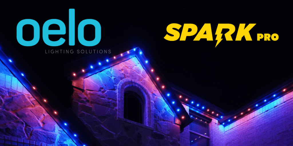 A home in Phoenix illuminated with vibrant red, blue, and purple permanent trim lighting from Oelo and Spark Pro.