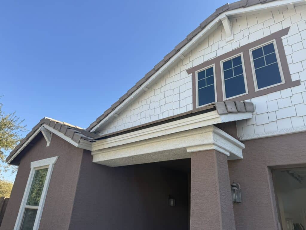 Color matched permanent outdoor lighting installed on Phoenix Arizona home with nearly invisible daytime appearance